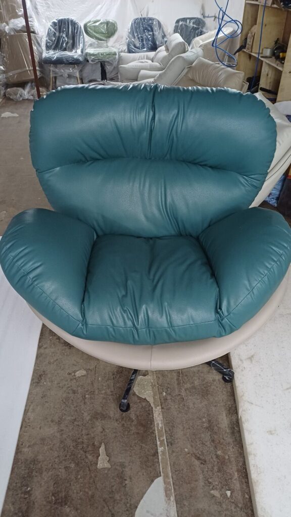 DKS 301 sofa chair in teal, photographed in the Delhi workshop before dispatch