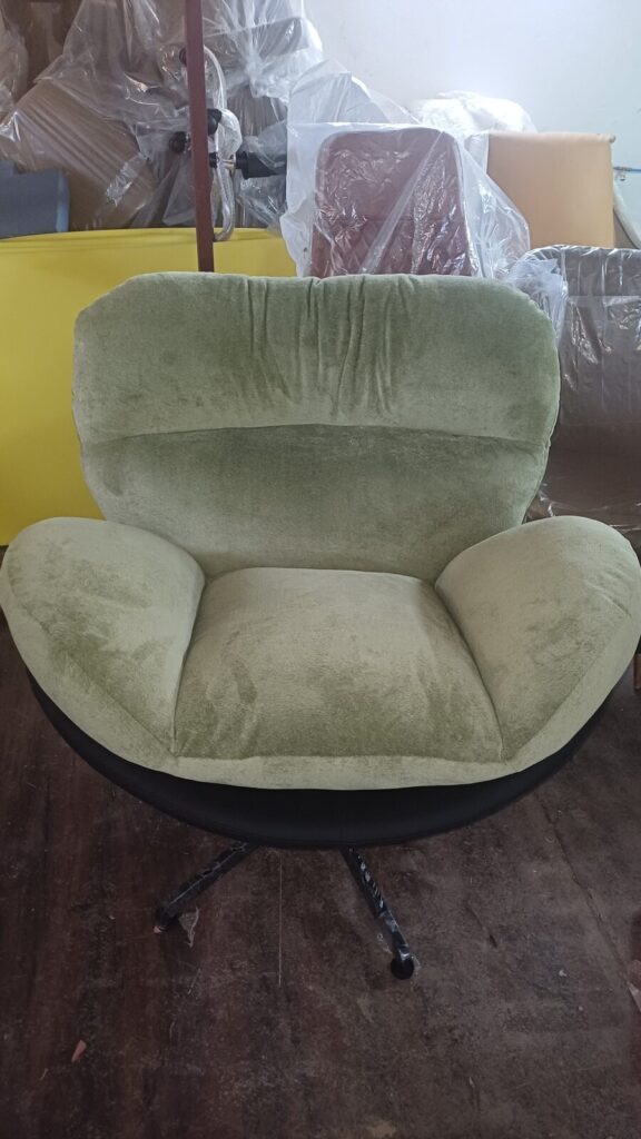 DKS 301 sofa chair in olive green, photographed in the Delhi workshop before dispatch
